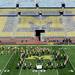 Members of the Michigan marching band, dance and cheer teams form the state of Michigan and the upper peninsula on the field during a Pure Michigan video shoot at Michigan Stadium on Wednesday. Melanie Maxwell I AnnArbor.com